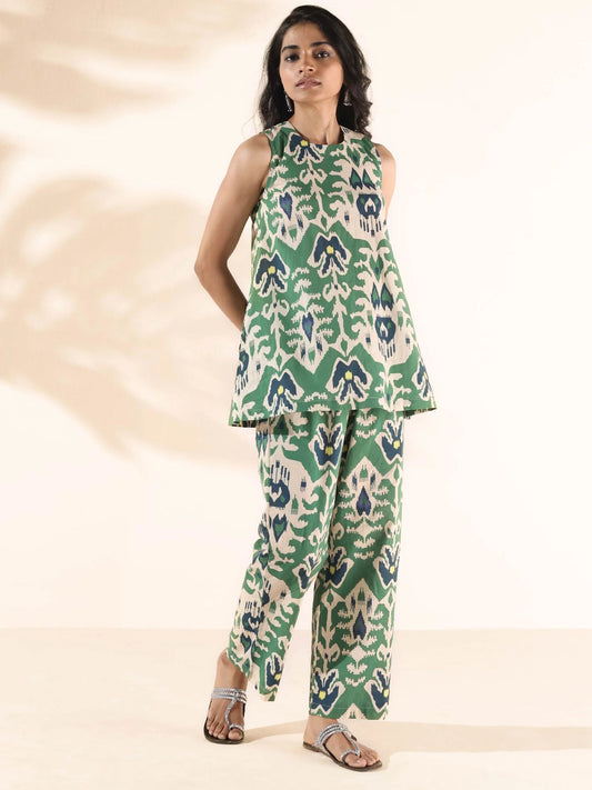 Presents Ikat Floral Printed Sleeveless Co-ord Set with round neckline. Paired with elasticated waist pant.