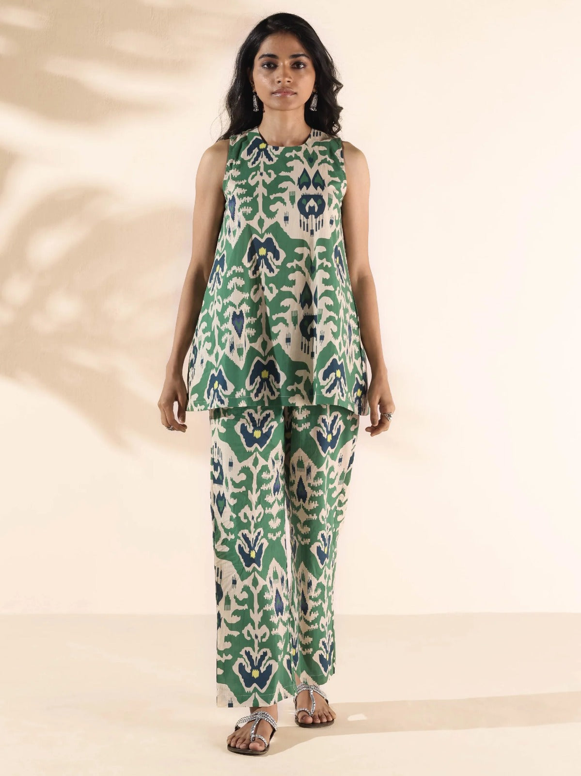 Presents Ikat Floral Printed Sleeveless Co-ord Set with round neckline. Paired with elasticated waist pant.