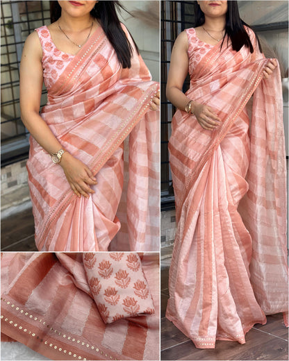 Wrap yourself in whispers of luxury- a saree that embraces you with elegance and style