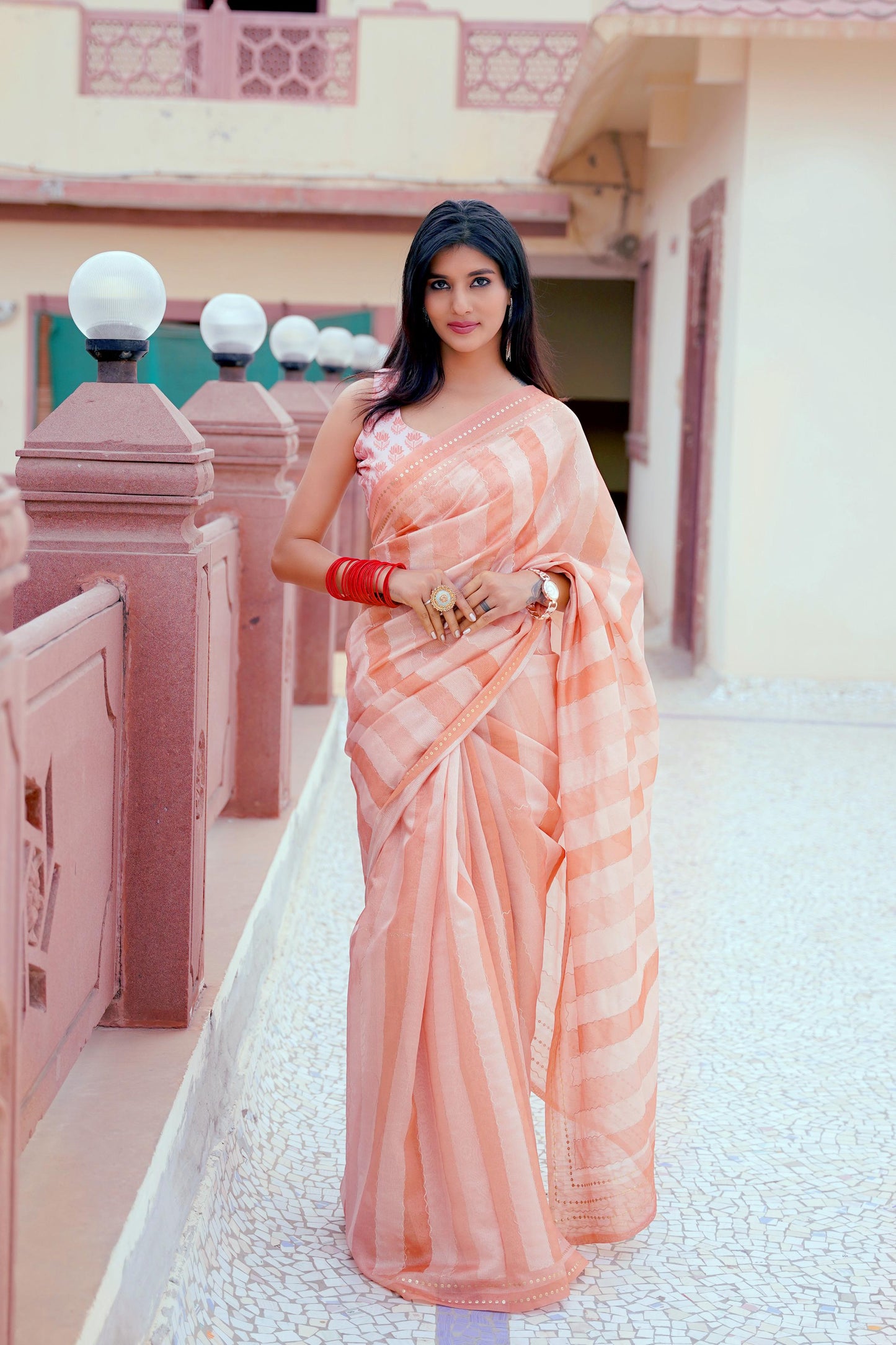 Wrap yourself in whispers of luxury- a saree that embraces you with elegance and style
