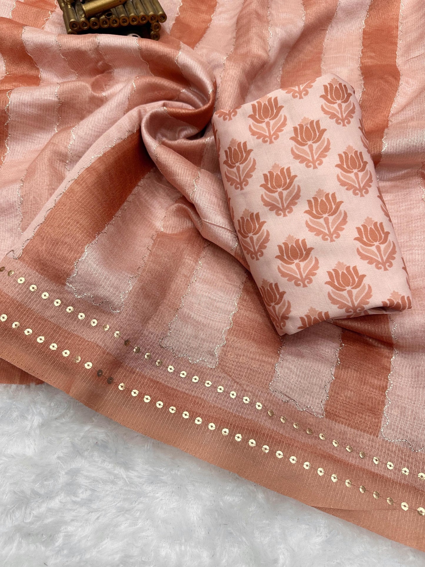 Wrap yourself in whispers of luxury- a saree that embraces you with elegance and style